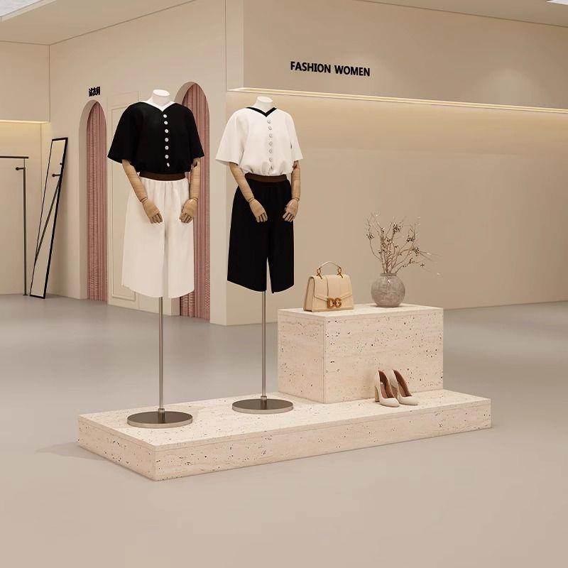 服装店展示柜简约现代中岛台洞石纹女装陈列柜橱窗地台摆放模特