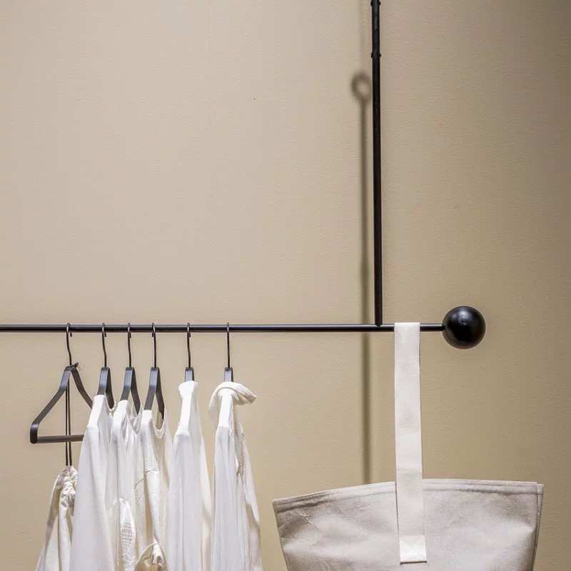 北欧简约金属衣架挂衣钩墙顶晾衣设计师高级感服装店顶架悬挂