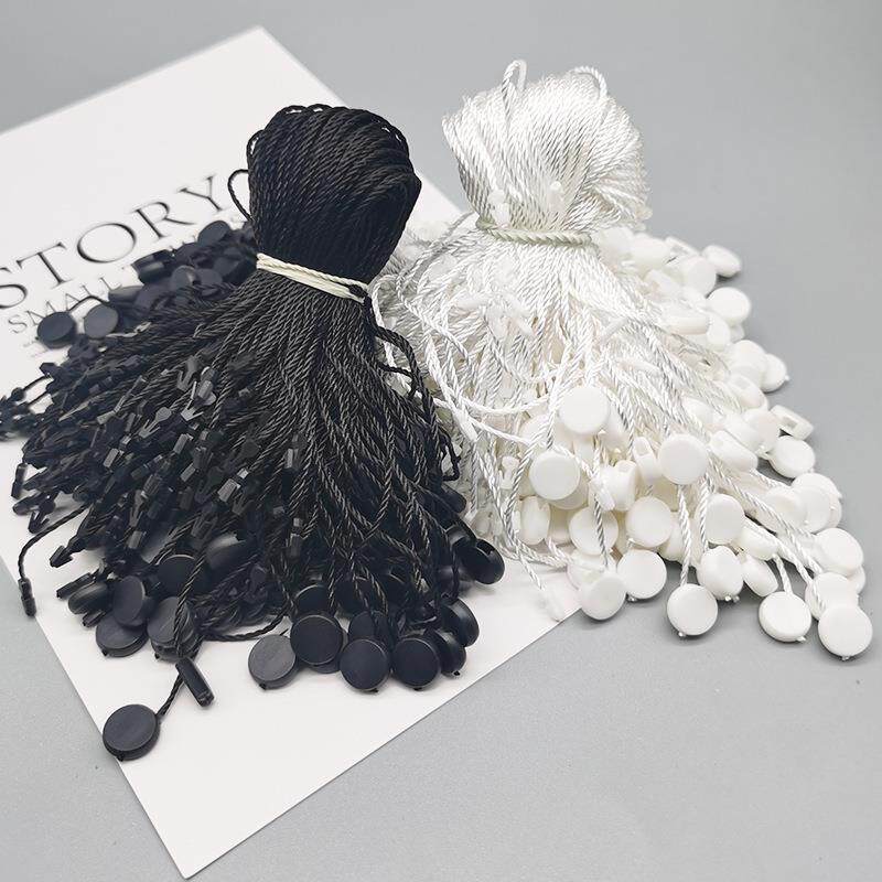 现货供应服装箱包吊粒 黑白圆形单插塑料吊牌绳 手穿绳 标签绳