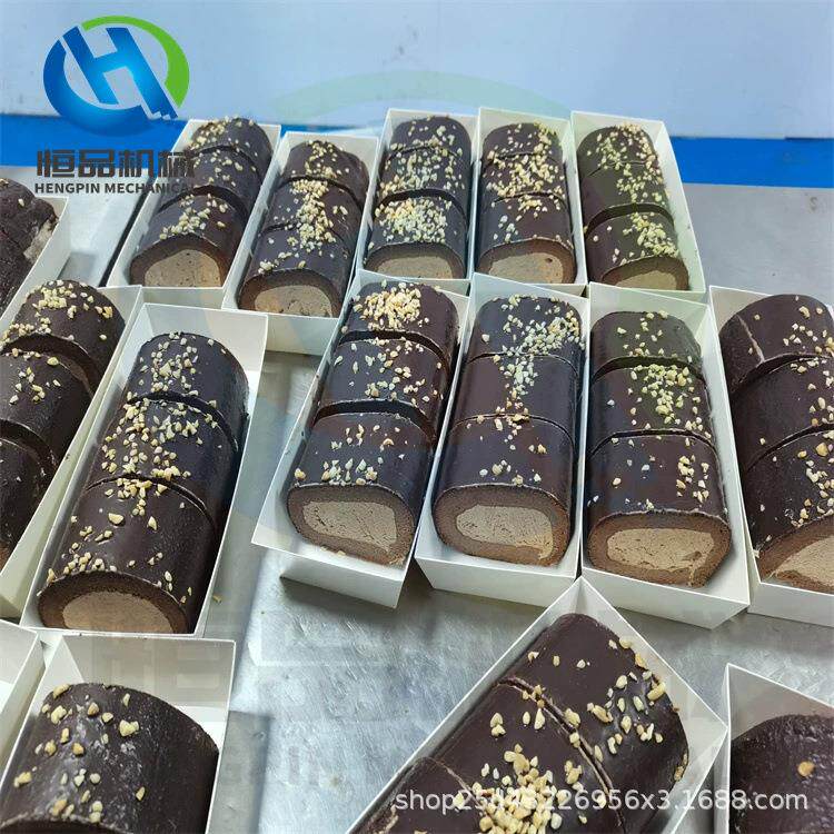 梦龙卷蛋糕卷面包巧克力涂层机恒品代可可脂裹涂设备带加热