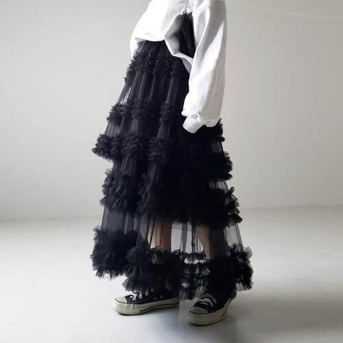 Layered half length skirt for women with a three-layer mesh