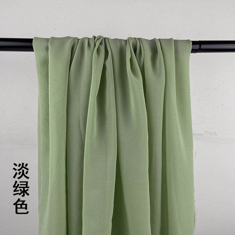 牛油果绿草绿婚庆户外布置纱幔酒红色白色服装婚纱礼服雪纺布料