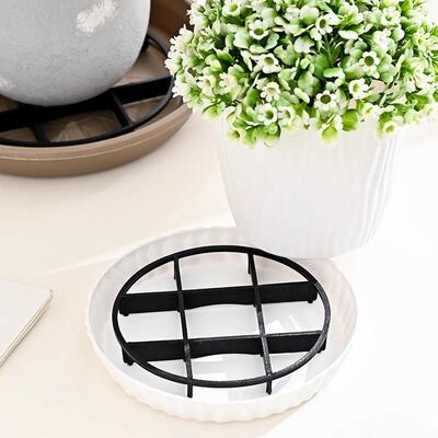 Elevated plant pot tray, designed to lift the base of flower