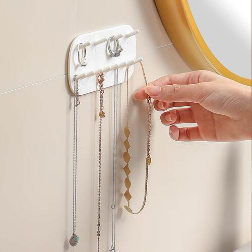 Wall-mounted jewelry organizer with no-drill hooks for rings