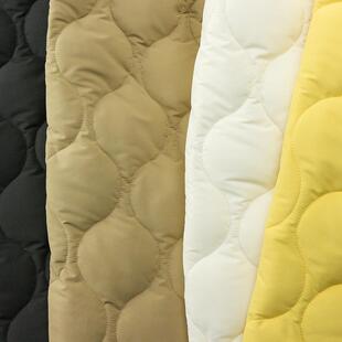 直销新款夹棉绣花面料涤纶秋冬衍缝棉服波浪葫芦绗棉布箱包设计师