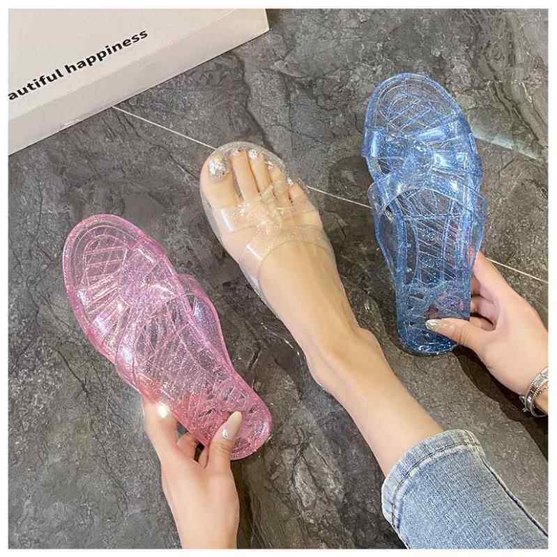 采购产品水晶透明果冻拖鞋的母亲，浴室沐浴，老式的塑料妇女的家