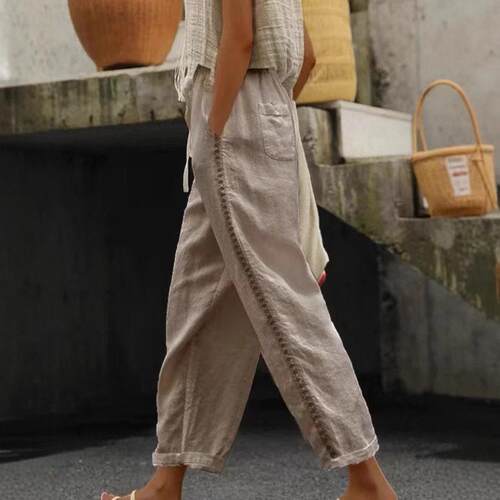 Nine inch women's spliced hollow straight leg pants