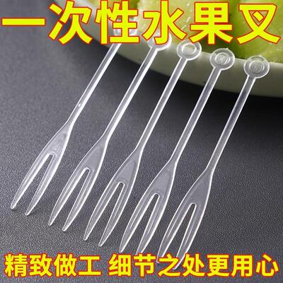 Single-use transparent plastic small forks, fruit picks, des