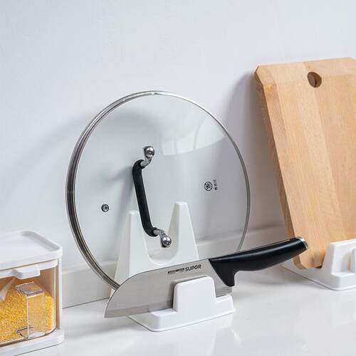A minimalist kitchen pot lid rack that is heat-resistant and