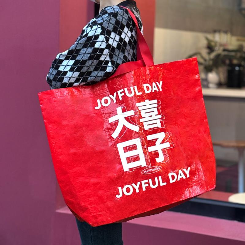 pp手提编织袋商用购物广告宣传服装展会蛇皮搬家覆膜红色编织袋