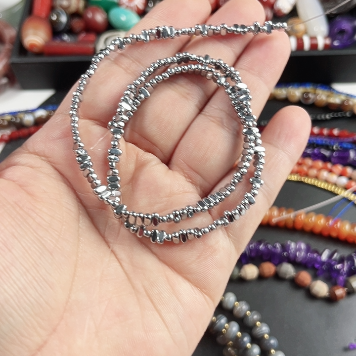 8mm不规则银色黑胆石一条40厘米长