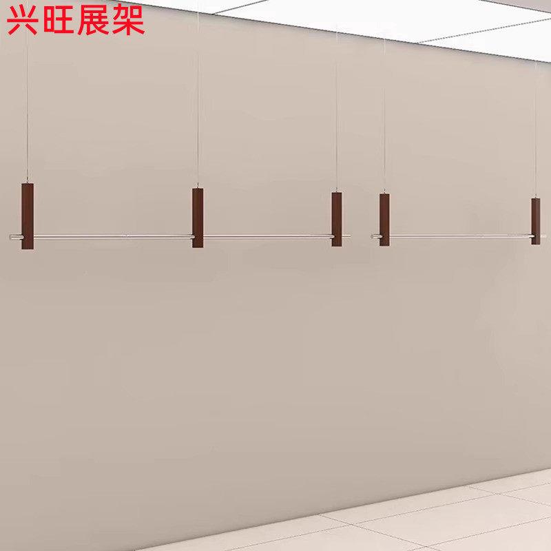 服装店不锈钢吊杆展示架胡桃木纹色悬吊式天花板悬挂衣架男女装店