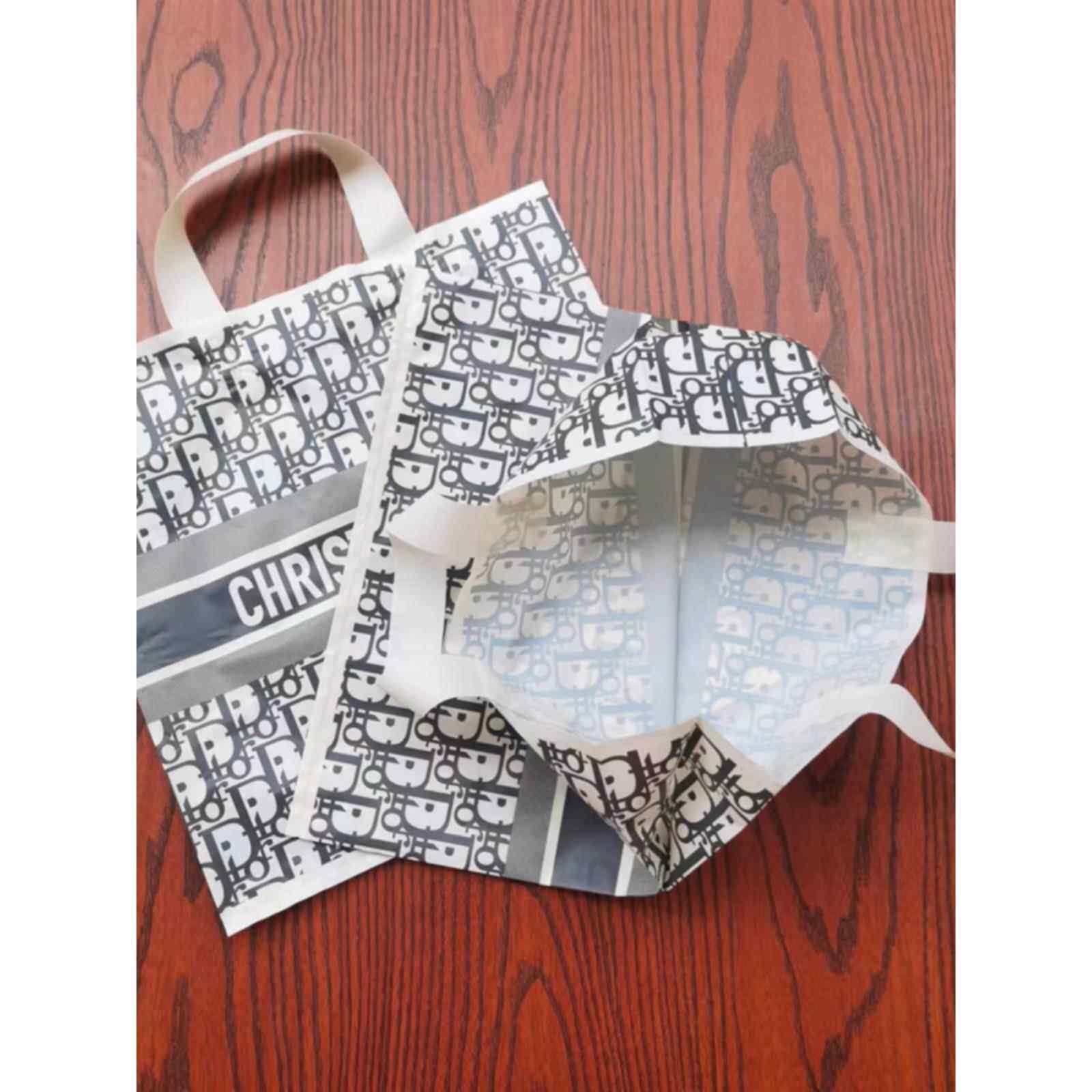 时装塑料包装袋新款服装胶袋毕业礼品袋手提袋购物袋手挽袋子