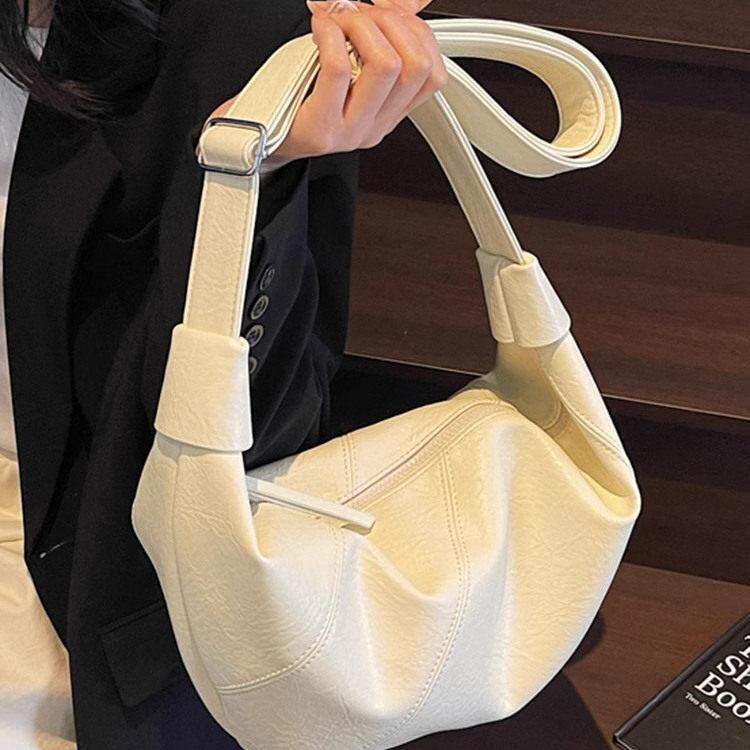 法国【设计师】SZ大容量女2025新款简约百搭单肩斜挎包通勤水饺包