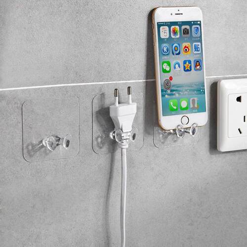 Wall-mounted plug hook with strong adhesive, no drilling req