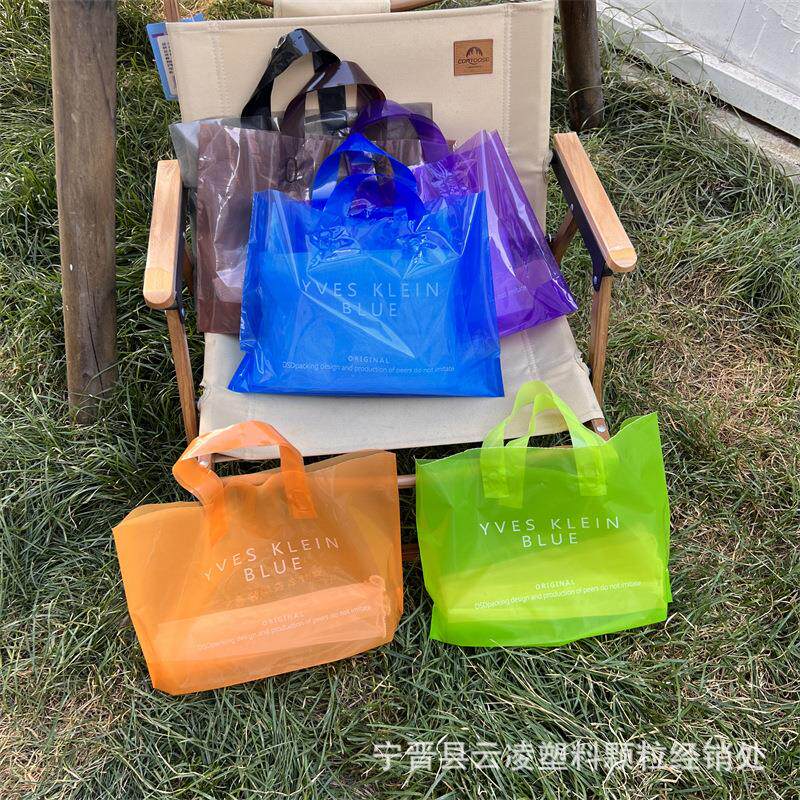 夏季透明塑料手提袋子好看的服装店用包装购物打包手拎袋好看