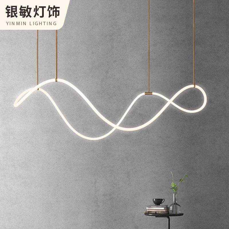 北欧设计师餐厅吊灯极简蜡烛展厅轻奢音符吧台灯办公室长条餐桌