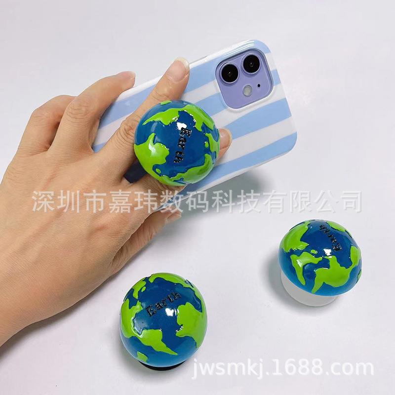 时尚个性立体半球环保地球UUA支工球系列手机星架球形气囊支架厂