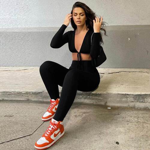 Women's open navel tied hollow long sleeved jumpsuit style