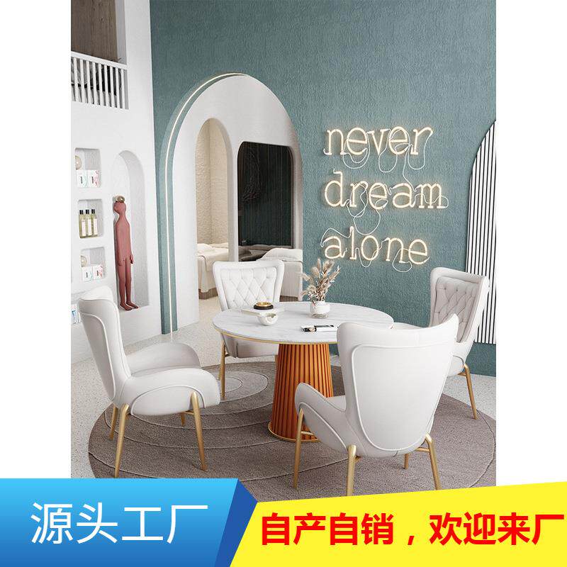 北欧轻奢风岩板餐桌椅组合网红餐厅家用小户型圆形下午茶吃饭桌子