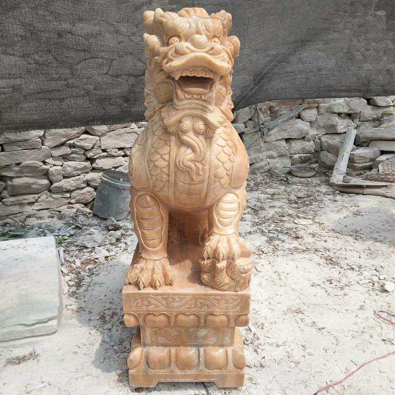 石雕麒麟晚霞红麒麟一对酒店门口摆件狮子大象动物摆件厂家制作