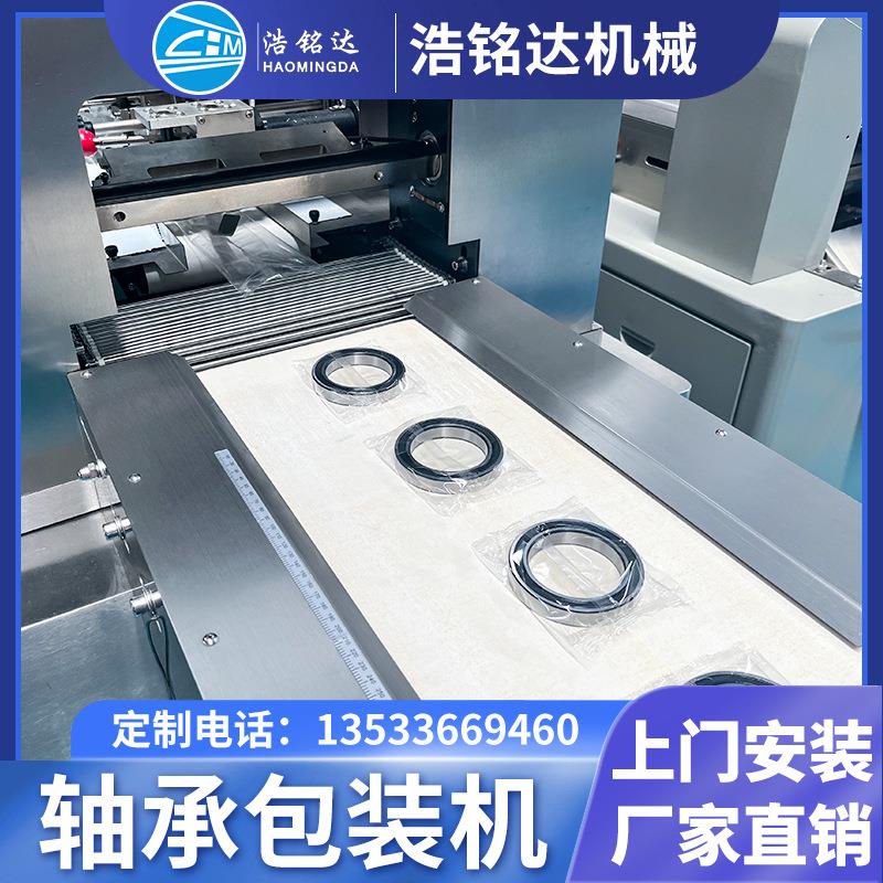 全自动承包手装式轴机合页铰链门把手装袋打包机五金797拉枕包装
