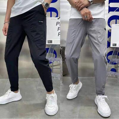 Ice silk splicing six pocket embroidered label men's pants
