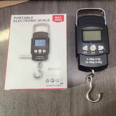 Handheld scale with tape measure spring suspension scale