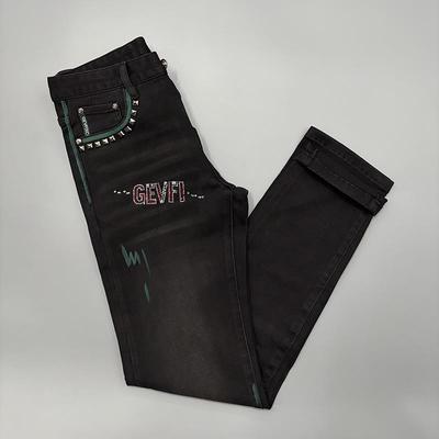 高级感黑色烫钻牛仔裤男秋冬新款手绘铆钉时尚潮流修身小脚长裤子
