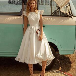 Women's short sleeved waist cinched dress and fluffy