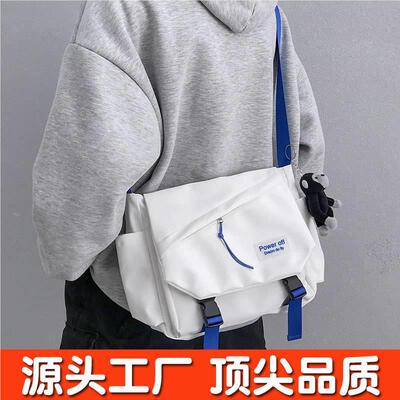男士斜挎包工潮休闲牌单肩SWE包大容量背男包邮差装包通勤横款手