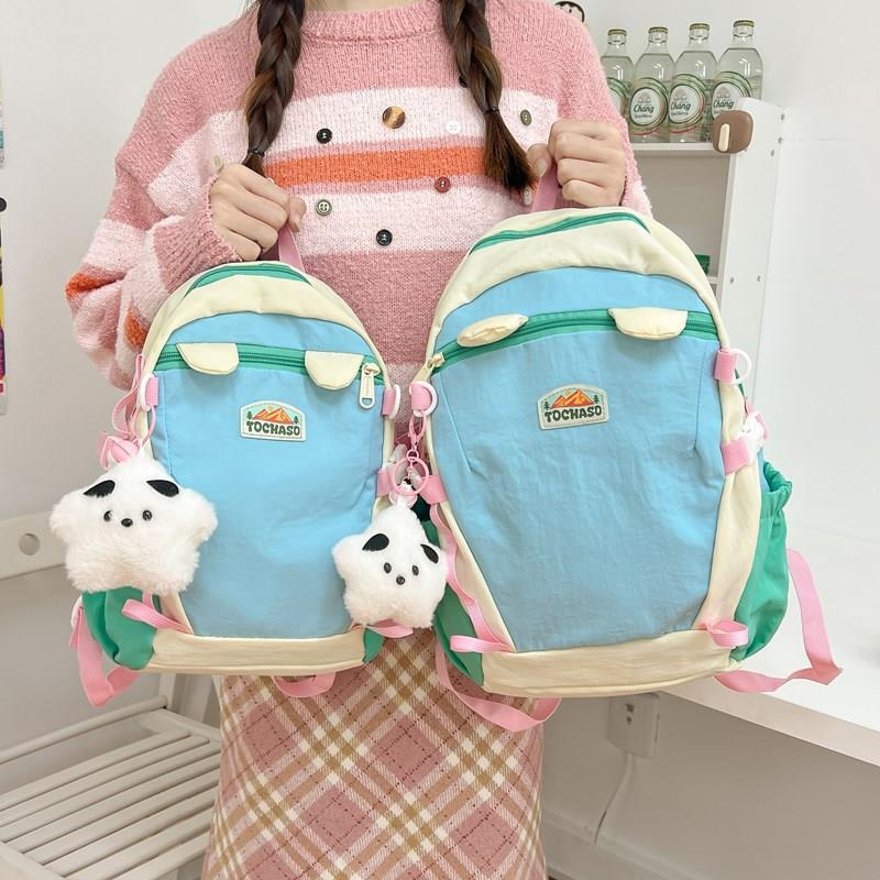 卡通可爱小学生书包撞色多巴胺风格背包大容量轻便户外休闲双肩包