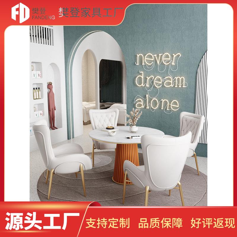 北欧轻奢风岩板餐桌椅组合网红餐厅家用小户型圆形下午茶吃饭桌子