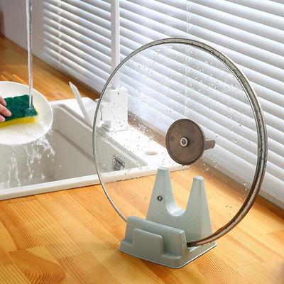 Two plastic cutting board racks for kitchen countertop, used