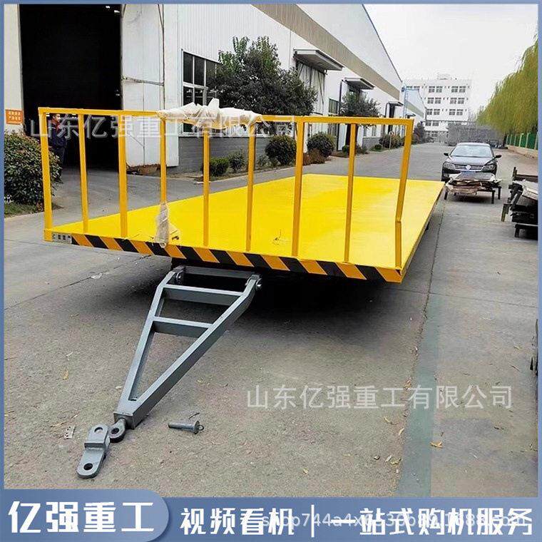 叉车拖挂平板车牵引式四轮转向工厂仓库物料周转车机场行李托运车