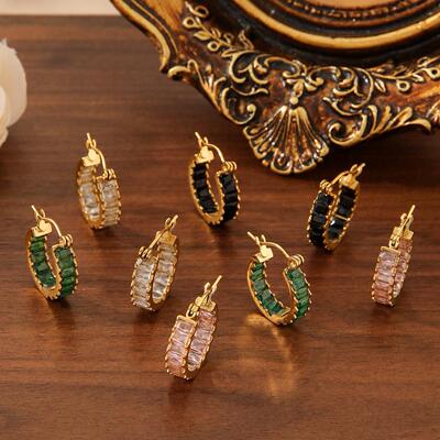 Round earrings with zircon gold inlay on both sides for