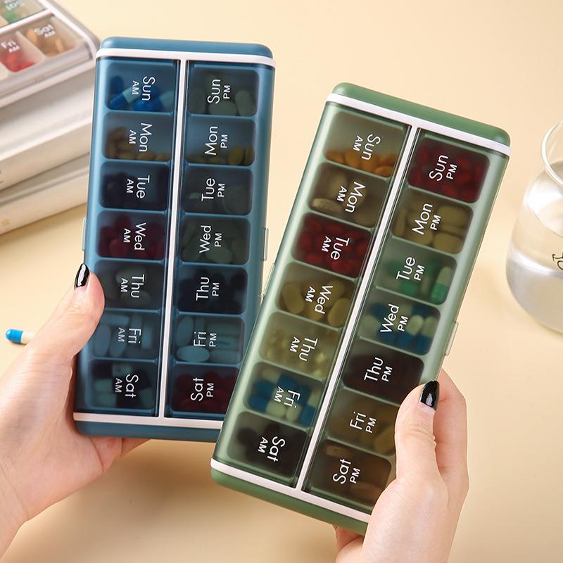 跨境新款一周七天便携式药盒14格药品收纳盒防尘防潮塑料分装盒