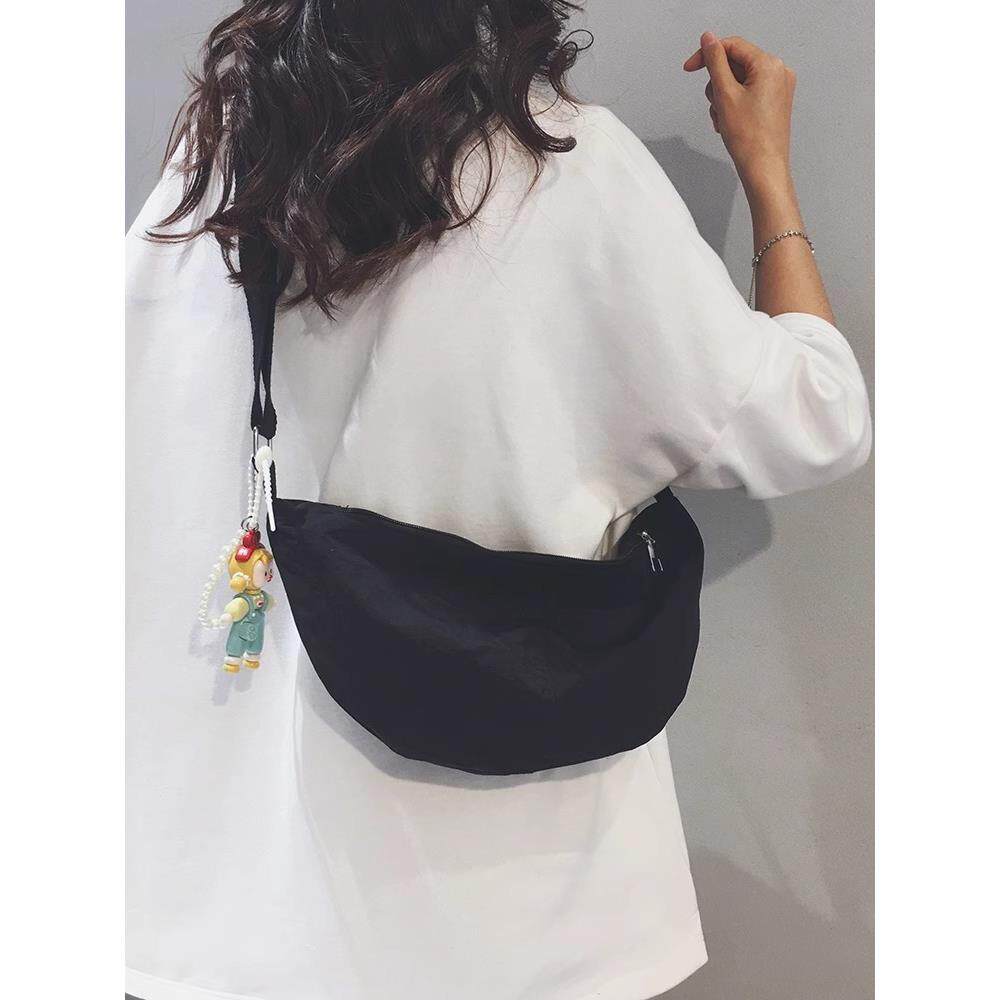 法国【设计师】SZ时尚帆布包女2025新款休闲通勤百搭斜挎包饺子包