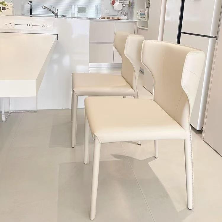 法式奶油风马鞍皮椅现代简约家用餐厅餐椅网红款靠背牛角椅