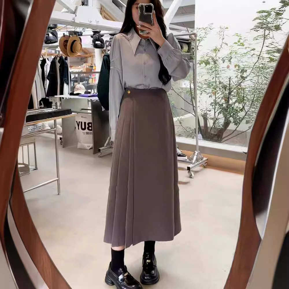 李潇洒微胖大码2025春季女法式高级感不规则设计长短版翻片百褶裙