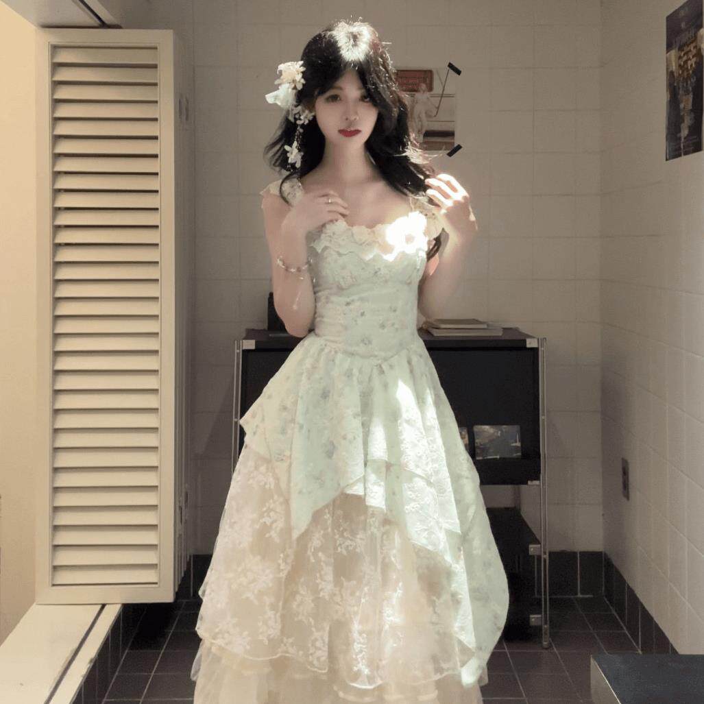 法式气质度假风绿色洋装女2025夏季新款不规则拼接设计感长裙子