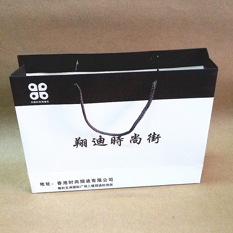 定做白卡/黑卡/銅板/牛皮/特種紙袋服裝紙袋環(huán)保袋免費設(shè)計手提袋