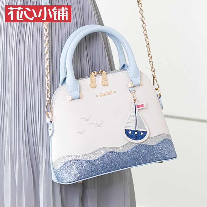 花心小铺2020新款撞色亮片绣花贝壳包手提单肩斜挎时尚女包包潮流