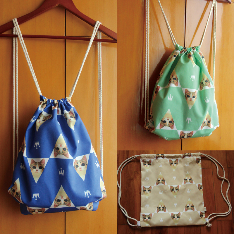 涤纶猫印花可爱文艺索袋双肩包