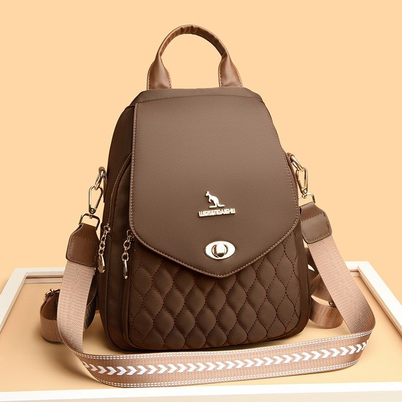 高级感双肩包女2024新款休闲大容量牛津布背包百搭帆布书包旅游包