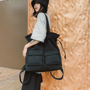 女子时尚工装风抽绳束口单肩包大包牛津布背包旅行双肩包两用