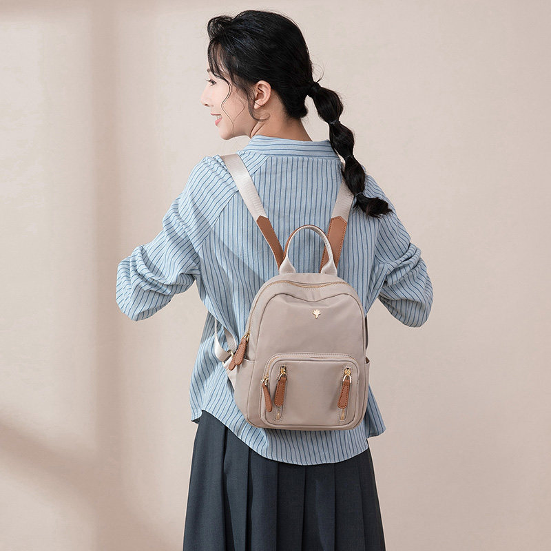 迷你双肩包女洋气上班通勤新款牛津布轻便小背包防盗旅行学生书包