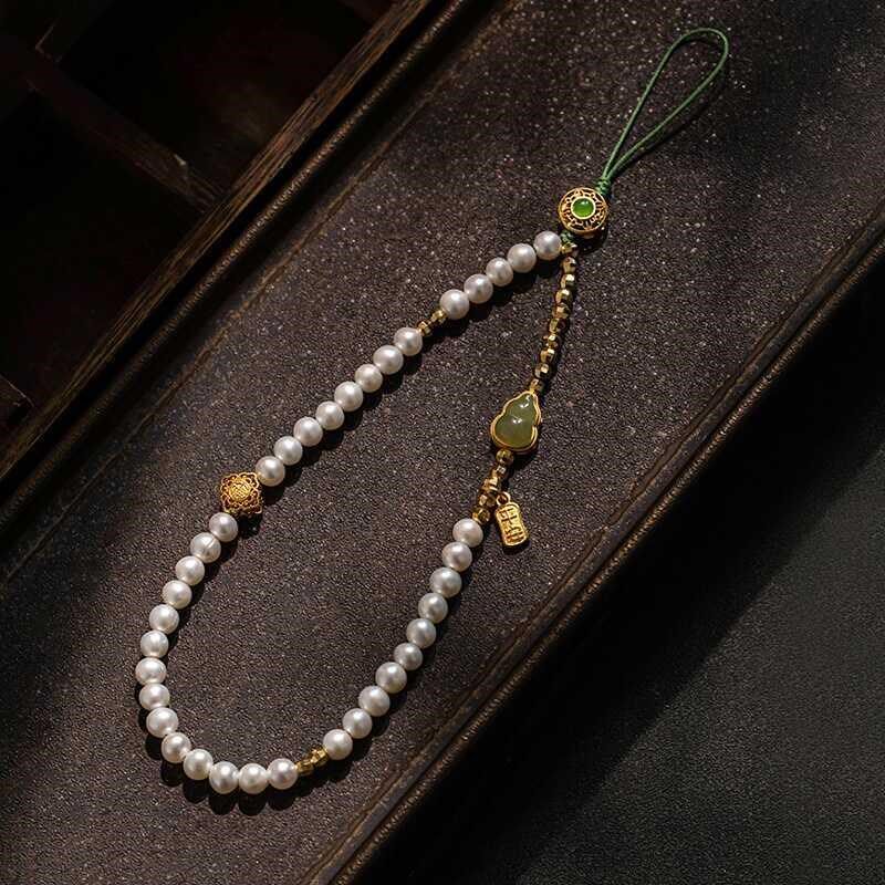 天然珍珠手机链挂件手腕挂绳小清新绿色高级文艺温婉女手机挂饰礼