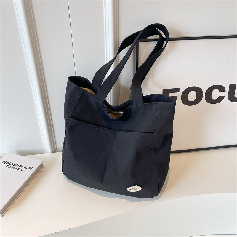 包包女秋冬时尚单肩包简约轻便帆布水桶包休闲大容量大学生上课包,箱包皮具/热销女包/男包,水桶包,淘宝优惠券,粉丝福利购,淘宝优惠卷