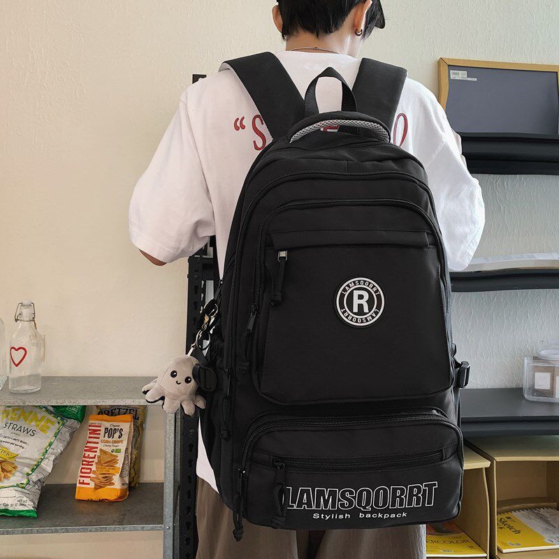 休闲大容量男生双肩包韩版女生大学生高中生轻便潮流书包电脑背包